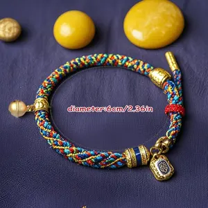 Tibetan Buddhist Carved Wealth God And Goddess Amulet Bracelet - Woven with Solid Golden Beads And Colorful Ropes, a Spiritual Protection And Wealth-Attracting Accessory for Meditation And Daily Wear, with Exquisite Protective Patterns