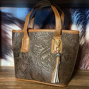 Genuine Leather Floral Embossed Tote Crossbody Bag with Tassel Charm and Gold Accents