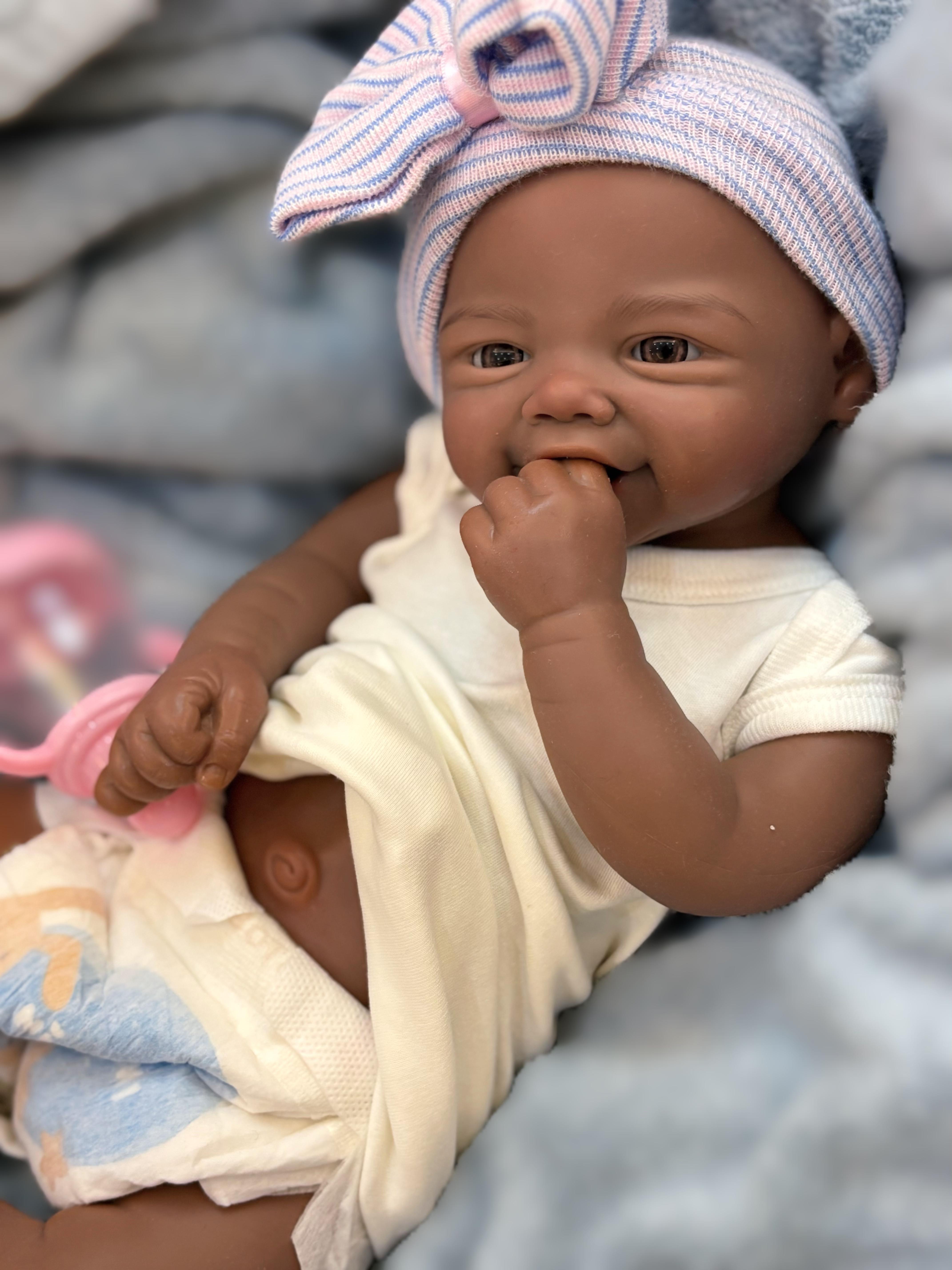 Reborn Doll Soft Silicone 18 inches Lifelike with Happy Smile Brown Skin Soft Body Realistic Details Includes Comfort Item Bottle Birth Certificate Perfect for Birthday Gifts Collectors and Children
