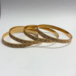 Gold Toned Bangles - 4 Piece Set Traditional Look with Modern Touch Elegant Design Versatile Appeal Perfect Fit for Any Occasion
