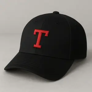 Black baseball cap embroidered with initials representing a personal name.