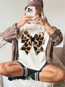 Lush & Lavish Bow ~ CC Unisex Size Garment Dyed T-Shirt Printed in the USA