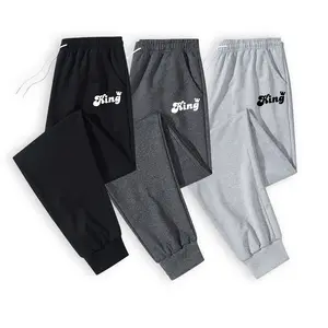 Discover Your New Go-To Essential with Our Ultra-Soft Men's Elastic Waist Joggers Featuring a Dynamic King Lettering Graphic for Unmatched Comfort and Contemporary Street Style Vibes