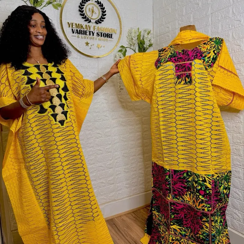 Luxury dry lace gown paired with Ankara