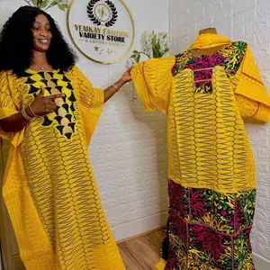 Luxury dry lace gown paired with Ankara