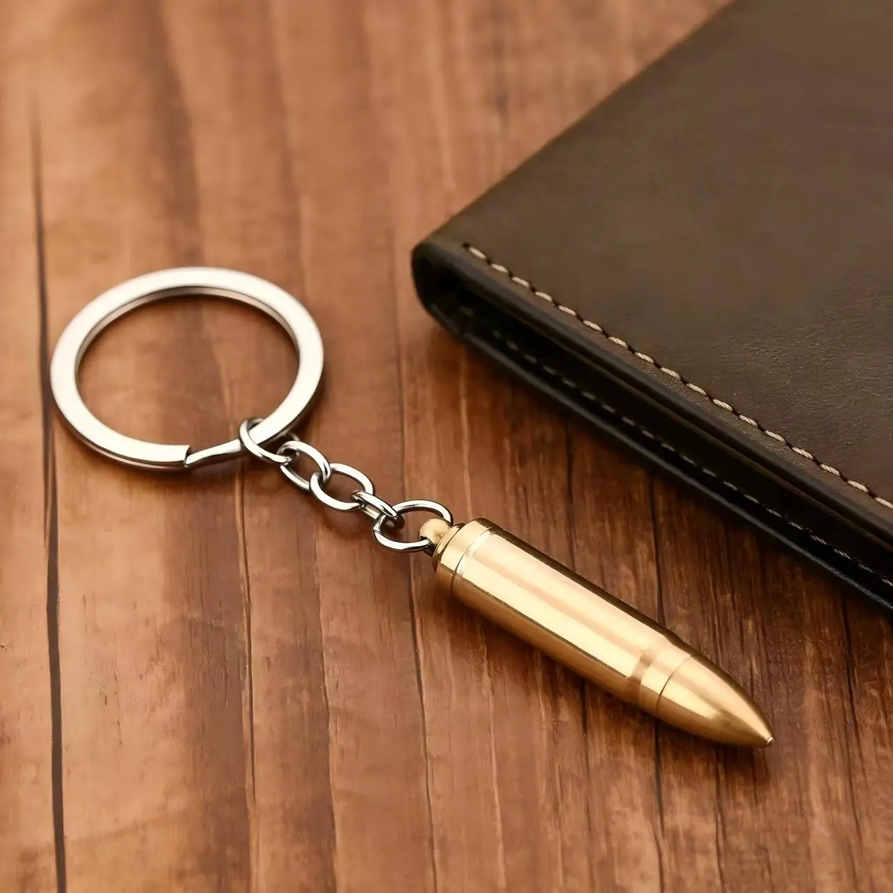 Metallic Keychain Ornament Shaped Like a Bullet — Decorative Hanging Accessory for Home, Car Mirrors, and Backpacks — Creative Holiday Gift Decoration