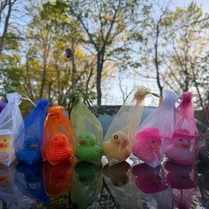 Custom Bling Ducks in Vibrant Colors, themes, and more! Packaged in Translucent Bags Perfect for Gift, or decoration.