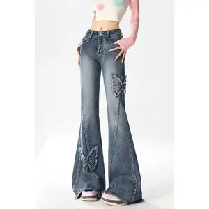 Women’s American retro flared jeans with butterfly embroidery, high waist, floor length, can be worn over a raincoat