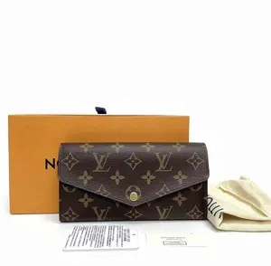 Pre-owned Louis Vuitton Sarah Wallet Monogram Canvas Brown