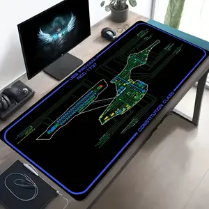 High Quality A Large Electronic Sports Gaming Mouse Pad With A Black Sci-Fi Starship Design In Blue And Green, Featuring A Clear Pattern. It Has A Non-Slip, Washable Rubber Base And Is A Spacious Desk Mat Suitable For Office Use. This Mouse Pad Is Perfect