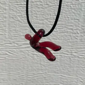 handmade glass “hangin’ in there” pendant
