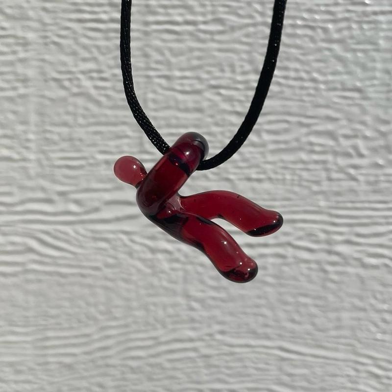 handmade glass “hangin’ in there” pendant
