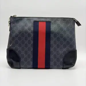 Pre-owned GUCCI Italy Clutches & Wristlets black flower red and blue stripes