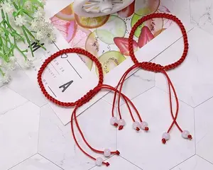 Knot Protection Red Cord Bracelet with Decorative Beads and Unique Design Elements for Stylish Protection