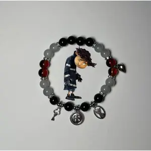 Coraline x Wybie” matching beaded bracelets