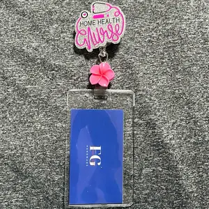 Blingy Badge Reel for Home Health Nurse with Pink Flower Charm and Blue ID Holder