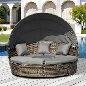 Gray four piece round convertible rattan daybed adjustable sun canopy cushions pillows for patio lawn porch leisure
