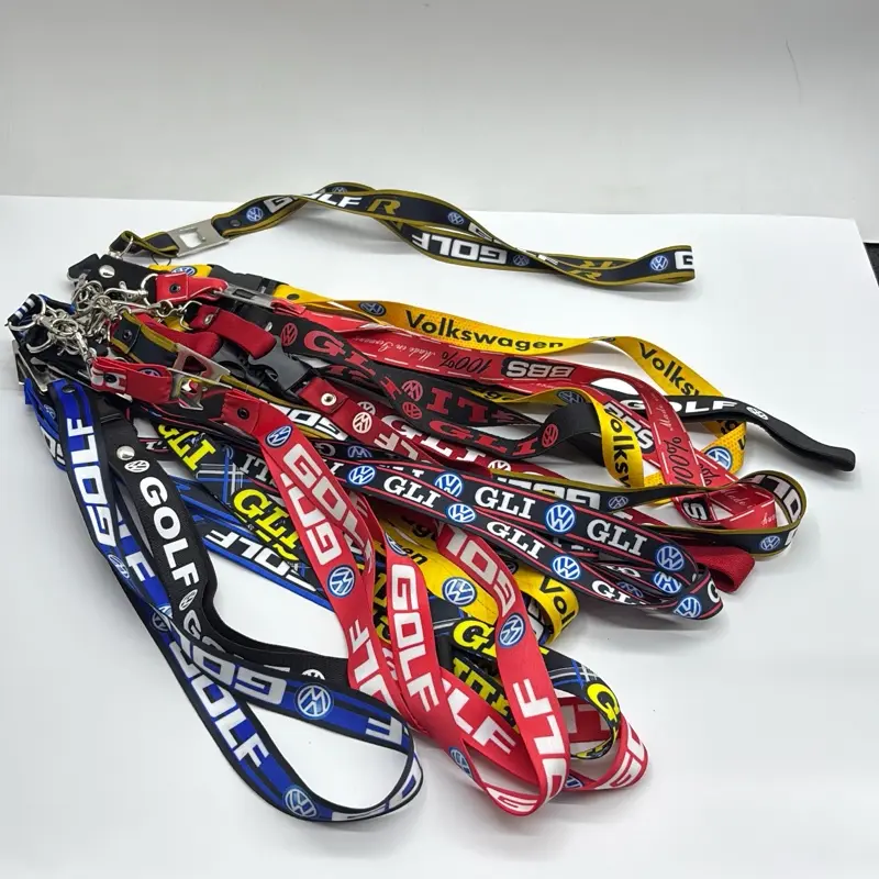 Volkswagen-branded lanyards for keys or accessories, specifically featuring designs themed around the Golf, GTI, and GLI models. Each fabric lanyard is equipped with a Samsonite-style clasp or a metal clip to secure keys or ID badges.