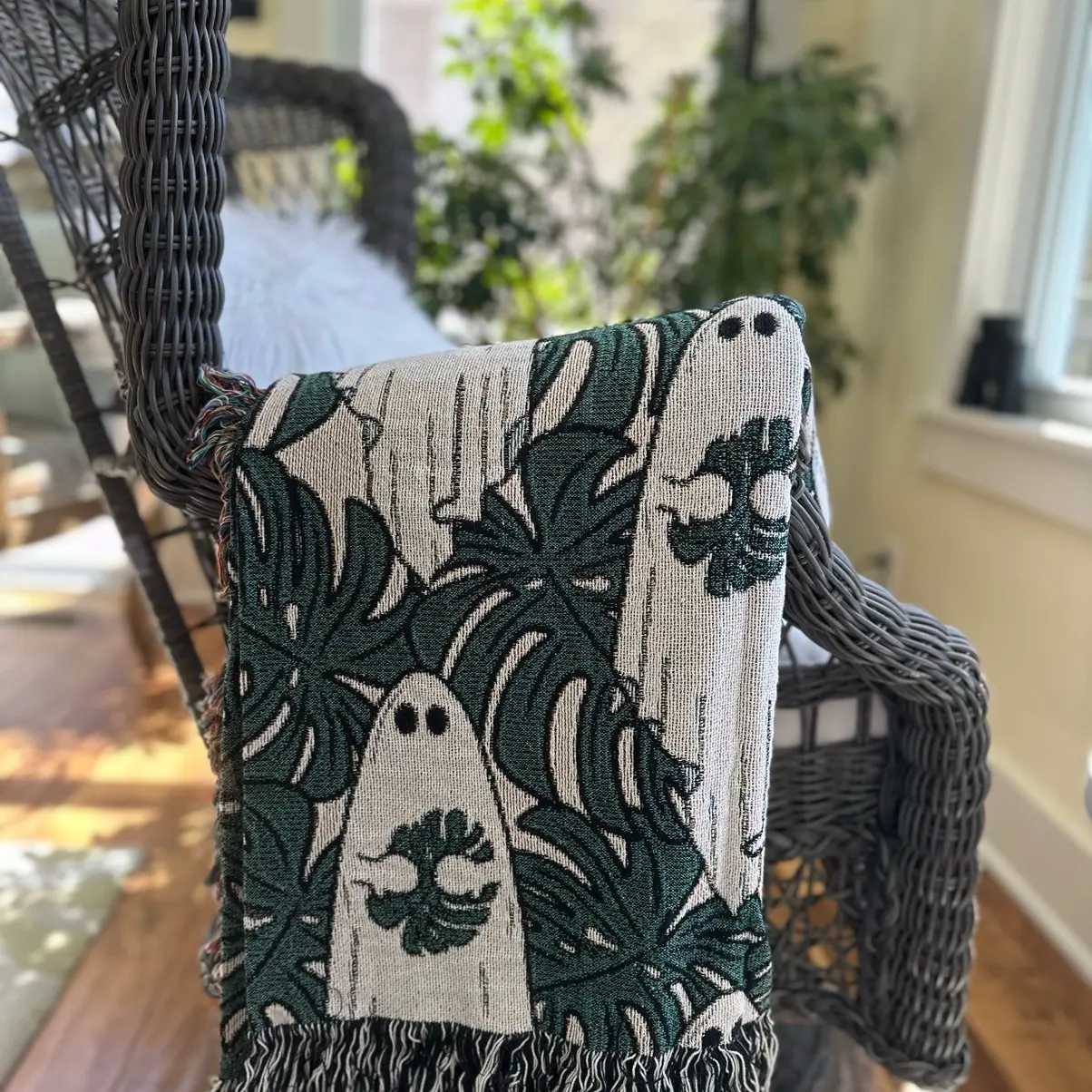 Ghost holding monstera leaf cotton woven blanket 50x60 - TikTok Shop