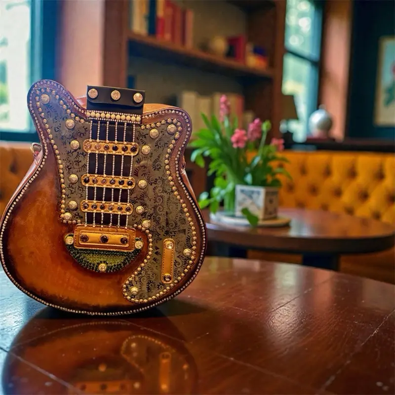 Fancy Shoulder Bag with Unique Guitar Design and Gold Studs for Stylish Outfits