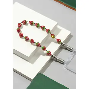 OSSA NEW YORK STRAWBERRY PAVE WRISTLET PHONE CHAIN