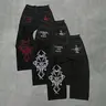 Men's street hip-hop fashion with skull embroidery on the back of straight-leg jeans Streetwear