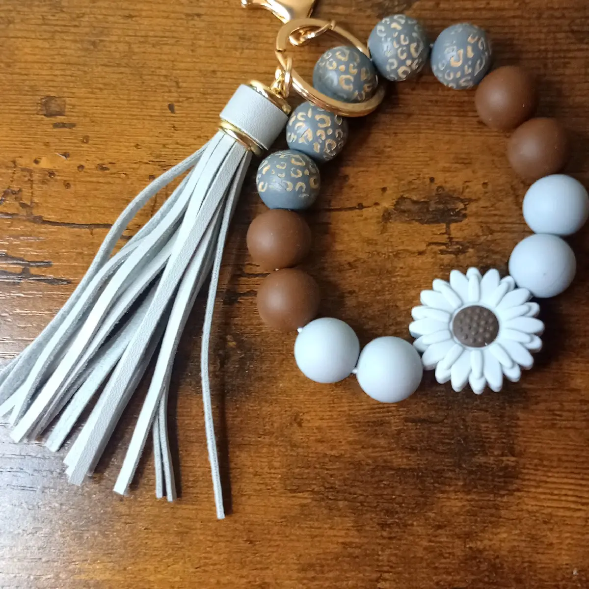 grey sunflower wristlet