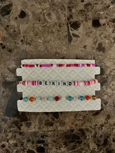 Letter Bracelets Design 3 Bracelets with Colorful Beads and "BE KIND" Message on White Background