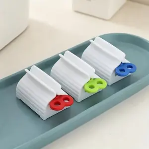 Toothpaste Squeezer Dispenser 3 PCS Random Color Manual Rolling Tube Squeezer for Toothpaste Facial Cream Lotion Cosmetic Tube Home Bathroom Accessory