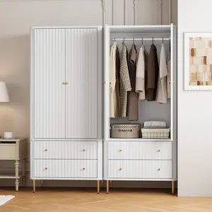 Wavy Texture White Wardrobe with Gold Handles and Drawers Spacious Clothing Storage Solution for Bedroom Dressing Room Guest Room Ideal for Fashion-Conscious Individuals Enhances Room's Aesthetic and Offers Plenty of Organizing Space Trendy Must-Have