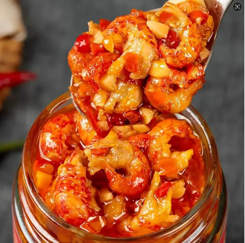 Haohuichi Garlic Flavored Crawfish Tails Sauce 238g - Rich Garlic Infused Savory Delight for Snacking or Side Dish Perfect for Any Occasion