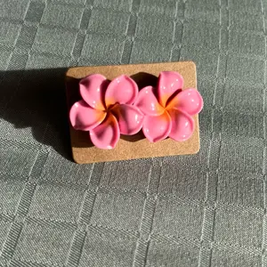 Dark pink Plumeria Flower Stud Earring with Yellow Center Rubber Packaging Penny Size