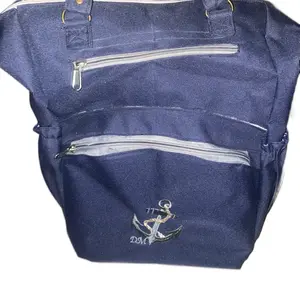 Diaper bag With drool cloths and handkerchief bibs