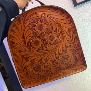 Genuine Leather Backpack with Intricate Floral Tooling Design for Stylish Everyday Use