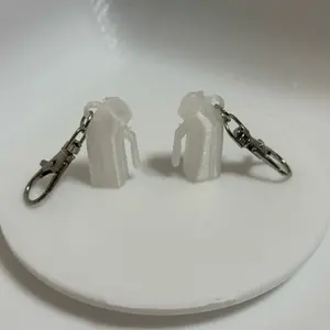 Urinal badge keychain
