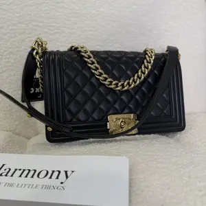 Pre-owned CHANEL Boy Medium Flap Bag, Black Quilted Calfskin with Aged Gold Hardware (2017 2018) 23449055 HK A028
