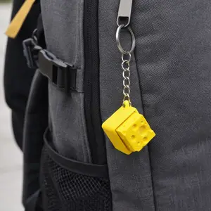 Tiny Fidget Cheese-Shaped Keychain, Fun and Cute Keyboard Key Ring, Colorful Cheese Block Design, Stylish Keychain, Perfect for Gifts and Trends