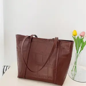 Leather brown rectangular handbag for women