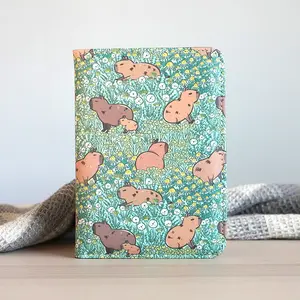 Noristudio Capybara Passport Wallet featuring Capybara Meadow Pattern with RFID Blocking