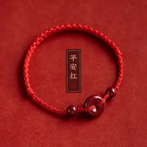 This red string bracelet with a health buckle is hand-woven and symbolizes peace and health. It's a cinnabar bracelet/ankle for men and women, representing their birth year.