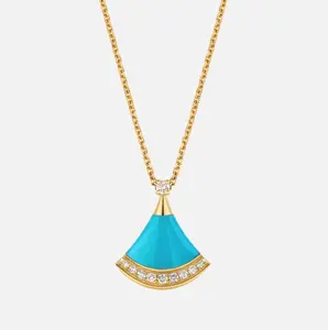 Pre-owned Bvlgari Divas' Dream 18 kt yellow gold necklace set with a turquoise element, a round brilliant cut diamond and pavé dias