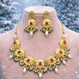 Elegant Gold Tone Necklace and Earrings Set with Red Gemstones and Pearl Accents for Special Occasions