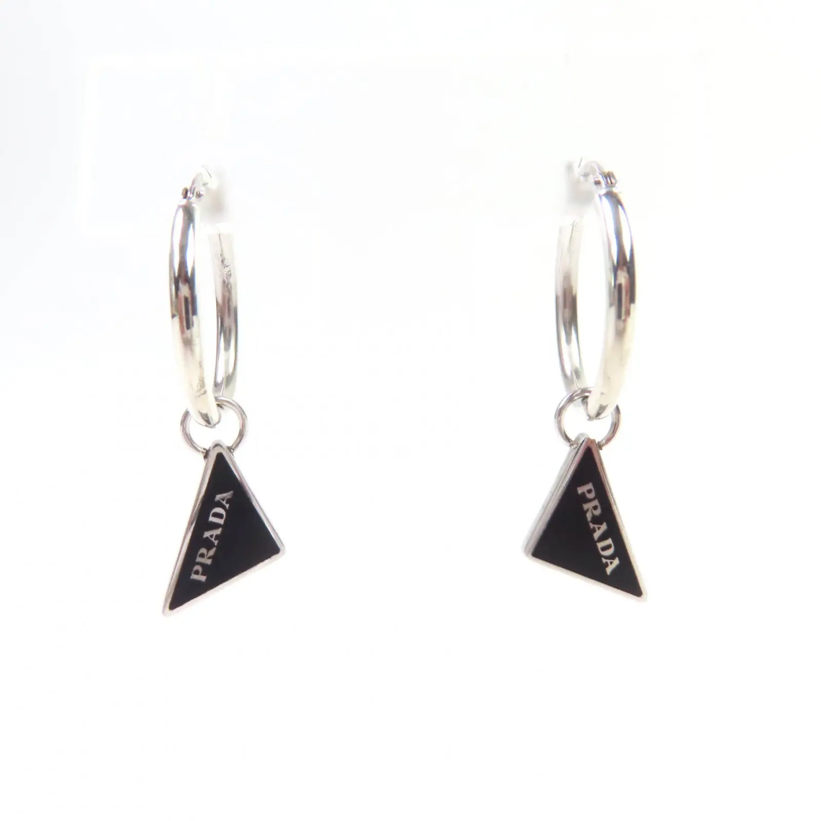 Pre-owned PRADA Sterling Silver 925 (Ag925) Small Leather Goods Pierce Symbol Pendant AG925 Earrings