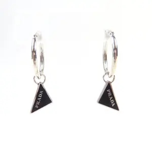 Pre-owned PRADA Sterling Silver 925 (Ag925) Small Leather Goods Pierce Symbol Pendant AG925 Earrings