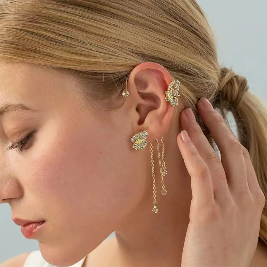 Butterfly tessud ears hanging gold left