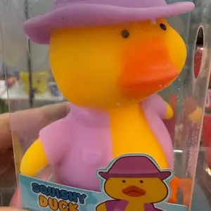 Velvet touch squishy duck removable raincoat stress relief toy colors vary