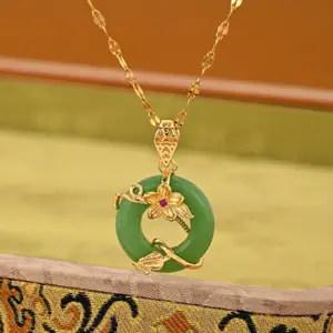 18K gold-plated necklace with a jade pendant inlaid with artificial stones. Jewelry for women.
