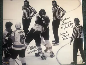 Terry O'Reilly  and Dave Schultz dual signed 16x20 with  double inscription,  NEP and Schultz hologram