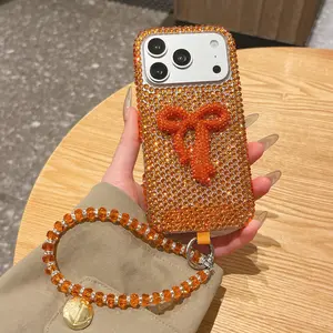 Gradient Full Diamond Bow Orange Sparkle Phone Case with Crystal Strap for iPhone 14/15/16/17 Pro/Pro Max Scratch-Resistant Eye-Catching Trendy Aesthetic Accessory
