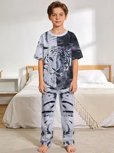 Black and white twin tigers spliced artistic conception 2-piece set: boys' digital printed short-sleeve pajamas with long sleep pants, made of flame-retardant fabric. A fashionable, trendy, casual, comfortable and soft pajama set, suitable for sleeping an